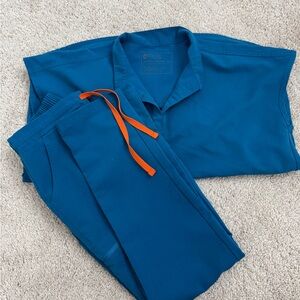 Figs Alps Blue Scrub Set with Orange Accent
